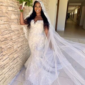 Custom made. Dress has been professionally cleaned.